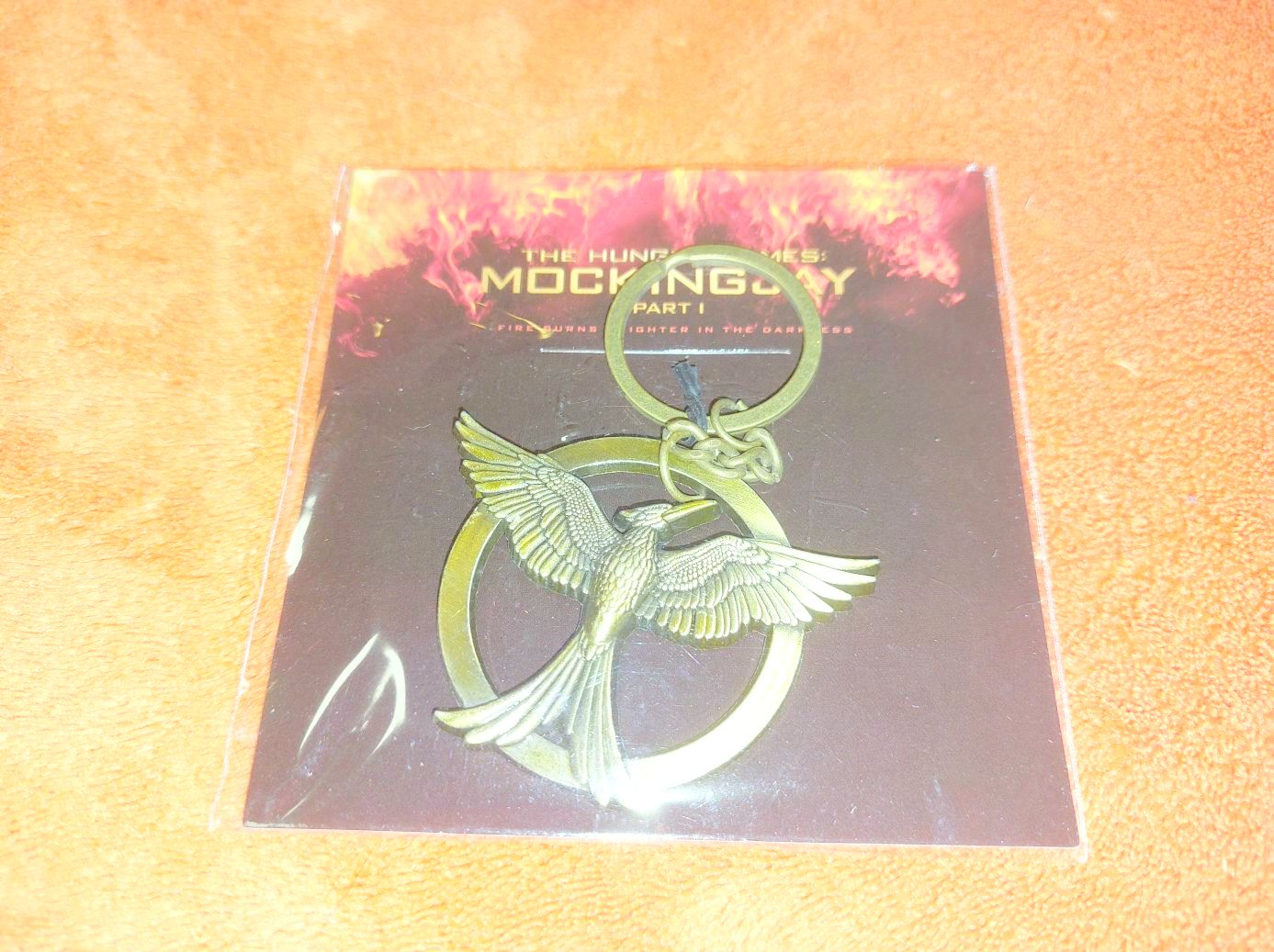 Az Éhezők Viadala (The Hunger Games) – Fecsegőposzáta Kulcstartó (Bontatlan)